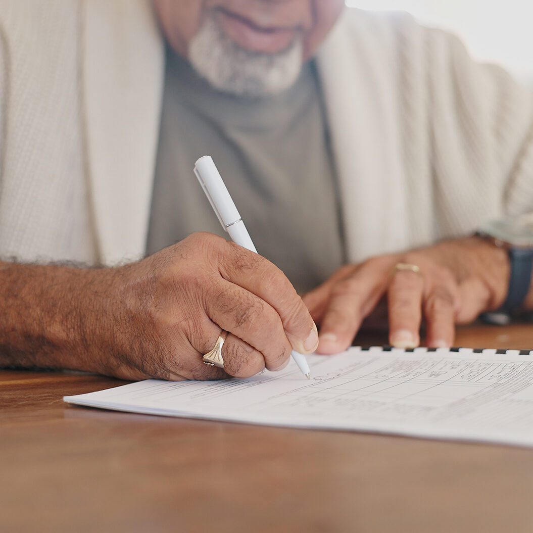 home-writing-and-old-man-with-documents-hands